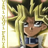A static image of a character with spiky blonde hair and dark eyes, wearing a white outfit with blue accents.