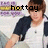 Pixelated image of a person holding a black object, with 'hot toy' text overlaid in black pixelated font.