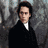 Four historical portrait images arranged in a , each depicting individuals in period attire with distinct backgrounds and color schemes