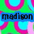 Pixelated icon with green background and pink-blue circular patterns, displaying text elements in blue and black boxes.