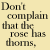 Pixelated text repeats 'Don't complain that the rose has thorns' and 'rejoice that the thorns have a rose' above three red-and-black flower icons on yellow background.