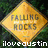 A diamond-shaped yellow sign with pixelated text reading "FALLING ROCKS" and a white horizontal line, set against a dark green background with the name "ilovejustin" in white at the bottom.