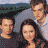 A static frame from an animated contact sheet showing a Nickel Creek promotional image with three people, red text, and date information on a light background.