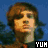 Three distinct pixelated portraits of a person with brown hair appear in a , each featuring the text 'YUH' at the bottom right corner