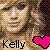 Pixelated image of a person with closed eyes and light brown hair, featuring two versions side-by-side: one with a pink heart symbol below the name 'Kelly' and another with a black heart symbol.