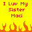Yellow background with red pixelated text reading "I Luv My Sister Maci" and orange flame-like shapes at the bottom.