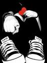 Static black-and-white icon showing two hands forming a heart shape with a red cherry on top, wearing high-top sneakers with striped laces against a solid black background.