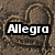 A static image with two heart-shaped sand imprints, a cookie graphic, and overlaid text reading "Allegra loves cookies!".