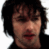 A static image shows a person with dark curly hair and red lips, next to text reading 'James Blunt' above 'you're beauti-ful'.