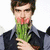 A split- image shows a person holding flowers in the top and eating them in the bottom, with text reading "I likes flowers" and "So, I eats the flowers."