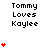 Pixelated text "Tommy Loves Kaylee" appears in three with red heart symbols arranged vertically on the left and right sides of the