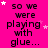 A bright pink background with repeated black text reading "so we were playing with glue..." and scattered white stars.