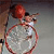 Pixelated static image of a basketball player in mid-action with red accents and blurred background.