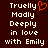 Dark red background with white pixelated text reading "Truelly Madly Deeply in love with Emily" and a single orange heart symbol replacing the 'y' in Truelly.