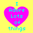 Four identical pixelated heart-shaped icons with cyan text on a yellow background, each displaying "I Adore Lots of things" in a retro digital style.