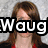 A pixelated image of a person with brown hair wearing a red and black top, with overlaid text reading "Waug Is The Best !!!" in bold white letters with black outlines.