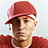 Animated contact sheet of a person in red clothing and cap with vertical text, showing frame-by-frame animation changes across 10 sampled frames arranged in a 4x3 grid.