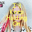 A pixelated image of a person with long blonde hair and red streaks, wearing a checkered shirt, with yellow text overlaid on the face.