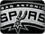 Static grayscale icon with pixelated text 'SPURS' over a stylized basketball court background featuring lines and hoops.