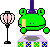 Pixel art of a green frog-like character with a purple top hat, holding a yellow object, standing on a patterned platform with two pink lanterns on black stands against a gray background.