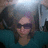 A pixelated image of a person with light hair and sunglasses on a bright blue background with pink text reading "Chelsea Loves Stefano".