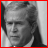nine grayscale portrait with red borders, each containing a pixelated text label below the image