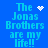 Blue background with cyan text reading "The Jonas Brothers are my life!!" and four distinct white pixelated symbols in different positions.