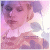 A pixelated image of a person with light purple hair and closed eyes, wearing a white top against a pinkish background.