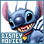 Pixelated blue alien character with large pink ears, black eyes, and a red-and-yellow striped scarf against white background.