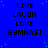 Blue background with white pixelated text reading LIVE LAUGH LOVE GYMNAST repeated in a pattern, with scattered light blue dots