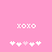 Pink background with white 'xoxo' text above two of pixelated hearts, one heart in each is light pink