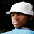 A person wearing a white cap and light blue shirt on the left, transitioning to a dark hat and striped collar on the right.