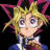 Animated character with spiky blonde hair and red accents, wearing a blue outfit with white collar, shown in two poses against black background.