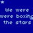 Blue background with repeated pixelated text "We were boxing the stars" and small white star symbols scattered throughout.