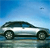 Pixelated image of a silver sedan on a reflective surface under a blue sky with a small dark object in the upper right.