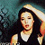 A 50x50 pixel animated buddy icon featuring a woman with long dark hair in a black sleeveless top, alongside green text reading "Original Icons .com" on a solid background.