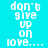 A static image displays the phrase "don't give up on love..." in white pixelated text against a cyan background with blue horizontal bars.