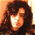 A 50x50 pixel buddy icon split into two frames showing a person with long curly hair on the left and green text "Original Icons .com" on a dark background on the right.