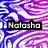 A pixelated image with swirling purple and blue patterns, featuring two black text boxes with white lettering reading "Natasha" on the left and "Rocks!!!" on the right.