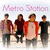 Four individuals stand in a under pink 'Metro Station' text on a light background, with one person in a red jacket and another in a maroon shirt