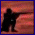 Silhouette of a figure holding a rifle against a sunset sky, transitioning to a bright sun, then to crosses on a dark background with red flowers, and ending with "Lest We Forget" text.
