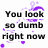 Pixelated text reads "You look so dumb right now" with purple decorative elements on a white background.