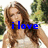 A pixelated image of a woman with long brown hair in a white top, with blue text reading 'i love' on the left and '2 sing!' on the right.