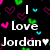 Pixelated text reads "I Love Jordan" on black background with scattered heart shapes in pink, purple, green, and cyan.