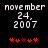 Pixelated text displays 'november 24. 2007' above red heart symbols on a black background, with one heart changing color between frames.