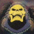 A split-frame contact sheet showing a pixelated yellow skull character on the left and green text reading "Original Icons .com" on the right against a dark background.