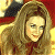 A pixelated contact sheet showing two frames of an animated buddy icon featuring a woman with long brown hair on the left and green text reading "Original Icons .com" on the right against a dark background.