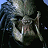 Static pixelated image of a humanoid skull with glowing eyes and sharp teeth against dark background, rendered in low-resolution 48x48 icon format.