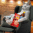 A pixelated image shows a character holding a red object against a blurred background with text reading 'wot? it's saturday nite!!' on the right side.