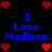 Pixelated blue text "I Love Madison" repeats across a black background with red heart symbols at corners and center.